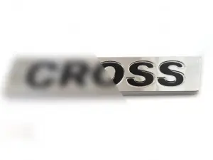 Шильдик CROSS черная надпись для Лада Ларгус Кросс Шильдик CROSS черная надпись для Лада Ларгус Кросс