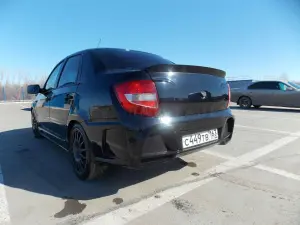 Задний бампер AVR с накладкой на крышку багажника для Лада Гранта седан Без покраски Задний бампер AVR с накладкой на крышку багажника для Лада Гранта седан Без покраски