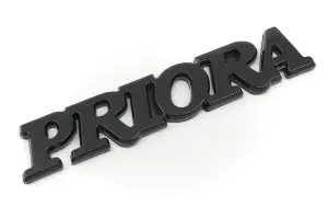 Шильдик Priora на крышку багажника, чёрный лак для Лада Приора, Приора 2 Шильдик Priora на крышку багажника, чёрный лак для Лада Приора, Приора 2