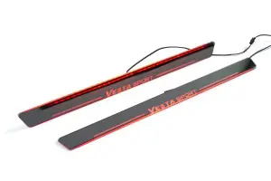 Оригинальные накладки на передние пороги с подсветкой и надписью VESTA Sport для Лада Веста Спорт Оригинальные накладки на передние пороги с подсветкой и надписью VESTA Sport для Лада Веста Спорт